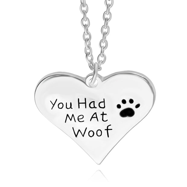 This Woof Heart Necklace will add a fresh look to your jewelry box. This necklace will be your new favorite piece of jewelry with its unique "You have Me At Woof" look and is excellent as a go-to accessory with anything you wear. This necklace provides a range of looks without too much distraction from your outfit, and your sidekick will want to give you a high-paw for your fantastically chic style sense. 