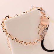 If you are a cat lover, you will purr with delight when you purchase this adorable Rose Gold Cat Bracelet. Made from high-quality material with a cat motif, this adorable bracelet is certain to be a hit. Team with a bodycon dress and matching heels for a complete look.