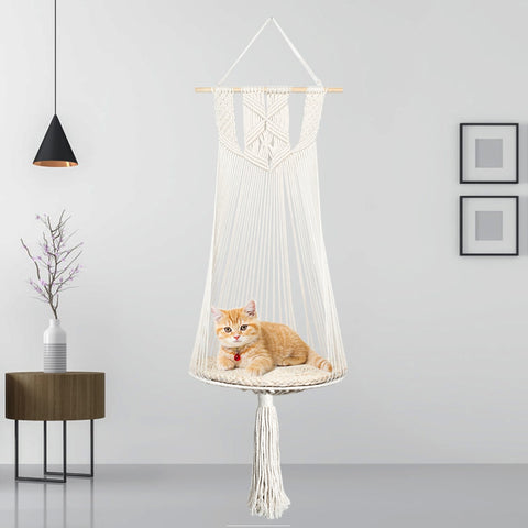 Give your feline friend a place to hang out and lounge in with the Macrame Hanging Cat Bed. This hanging cat bed is designed using an ultra-premium macrame fabric. Your cats will lounge in style on a raised porch overlooking their empire.  If you have a window nearby, your kitty will enjoy the views in comfort with the opportunity to curl up and nap in the sun.